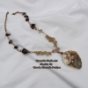 Sea shell pendant with rutilated and smokey quartz accent stones