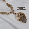 Sea shell pendant with rutilated and smokey quartz accent stones